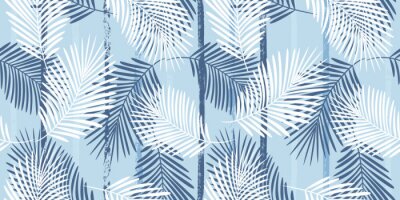 Feuilles de palmier sur fond bleu