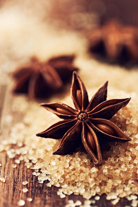 Papier peint  Anis sur du sucre brun