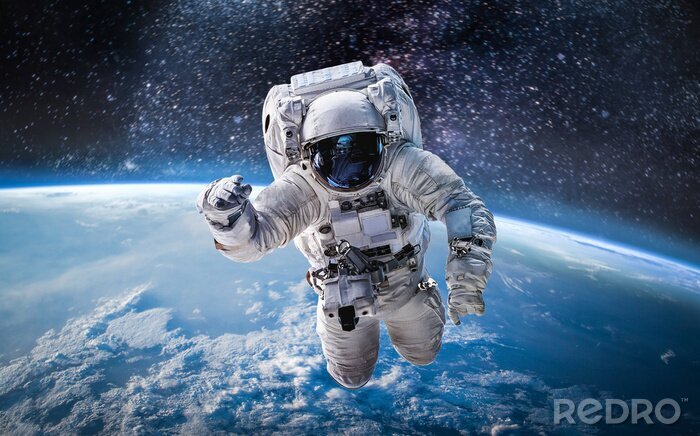 Papier peint  Astronaute au-dessus de la planète Terre