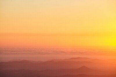 Papier peint  Aura de ciel orange au coucher du soleil