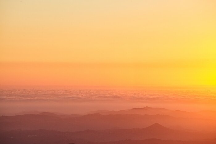 Papier peint  Aura de ciel orange au coucher du soleil