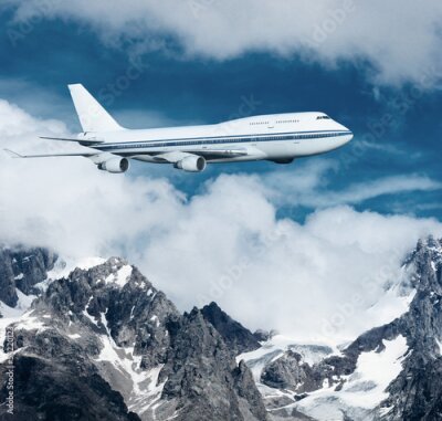 Papier peint  Avion de ligne survolant des montagnes enneigées