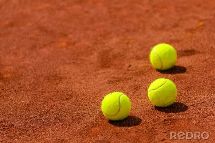 Papier peint  Balles de tennis sur terre battue