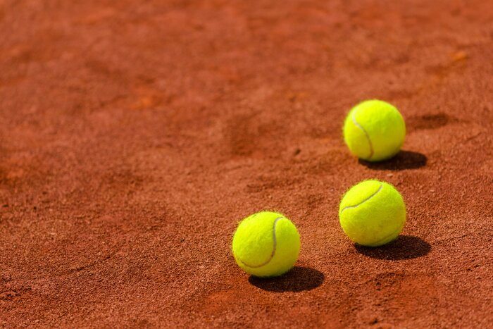 Papier peint  Balles de tennis sur terre battue