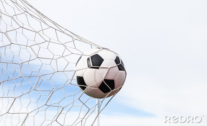 Papier peint  Ballon de football entrant dans le but