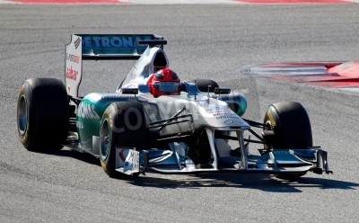 Papier peint  BARCELONA, SPAIN - FEBRUARY 18, 2011: Michael Schumacher of Mercedes team driving his F1 car during Formula One Teams Test Days at Catalunya circuit.