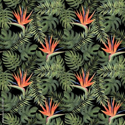 Papier peint  Beach cheerful seamless pattern wallpaper of tropical dark green leaves of palm trees and flowers bird of paradise (strelitzia) on a black background