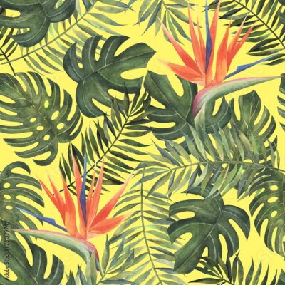 Papier peint  Beach cheerful seamless pattern wallpaper of tropical dark green leaves of palm trees and flowers bird of paradise (strelitzia) on a light yellow background