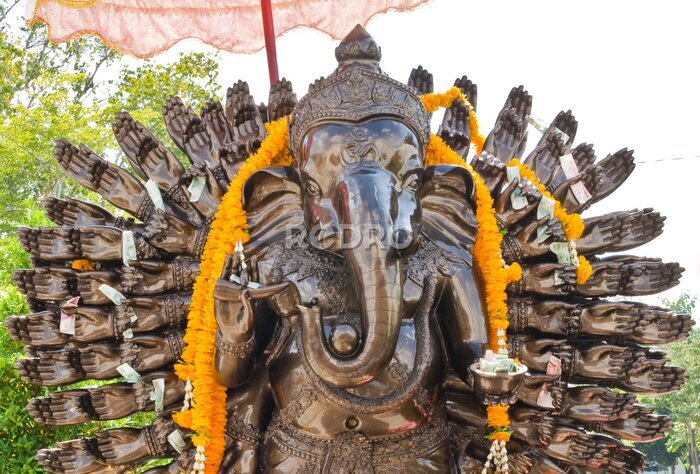 Papier peint  Beaucoup de bronze coulé mains de dieu Ganesha avec le jaune guirlande.