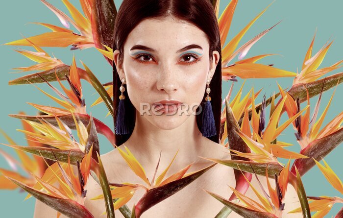 Papier peint  Beautiful young woman with many strelitzia flowers on color background