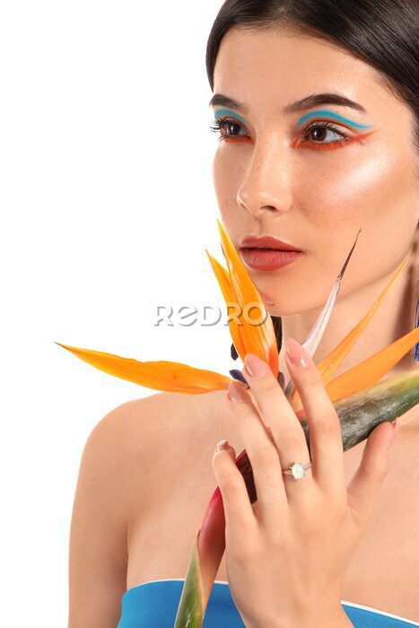 Papier peint  Beautiful young woman with strelitzia flower isolated on white