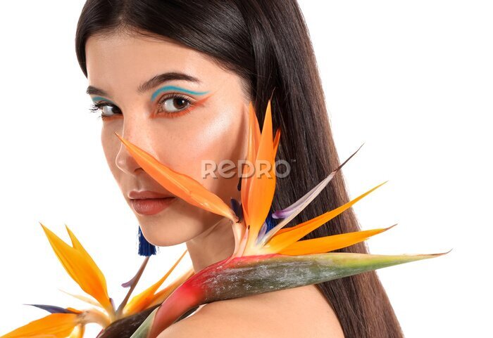 Papier peint  Beautiful young woman with strelitzia flowers isolated on white