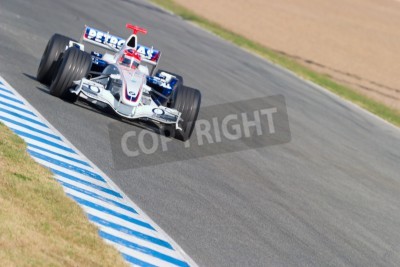 Papier peint  Bolide en pleine course piste formule 1
