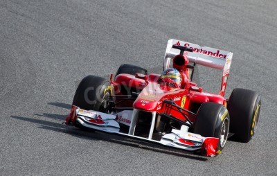 Papier peint  Bolide Ferrari sur la piste de course