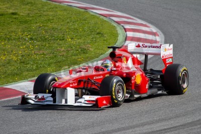 Papier peint  Bolide rouge sur une piste noire