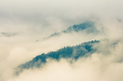 Papier peint  Brouillard beige et chaînes de montagnes