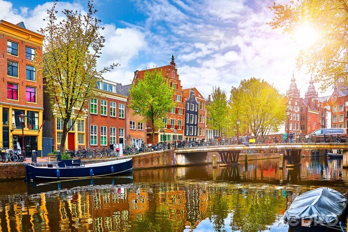 Papier peint  Channel in Amsterdam Netherlands houses river Amstel landmark