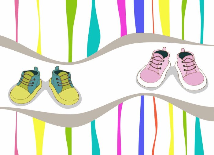 Papier peint  Chaussures d'enfants sur un fond coloré