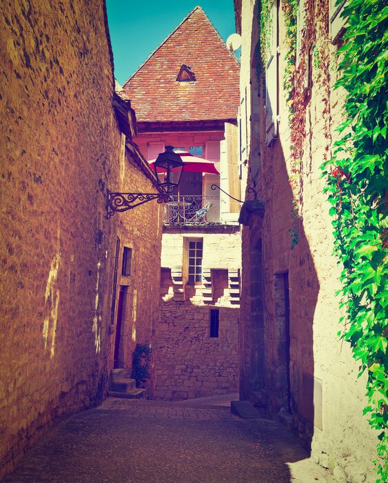 Papier peint  Chemin au milieu des maisons en pierre