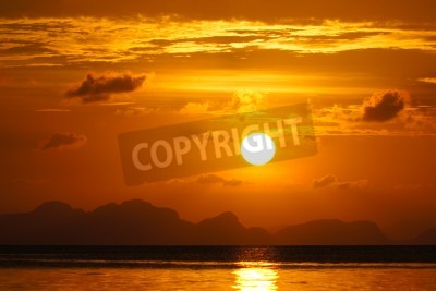 Papier peint  Ciel orange au coucher du soleil