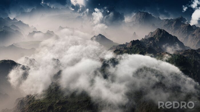 Papier peint  Clouds over mountain range. Aerial view.