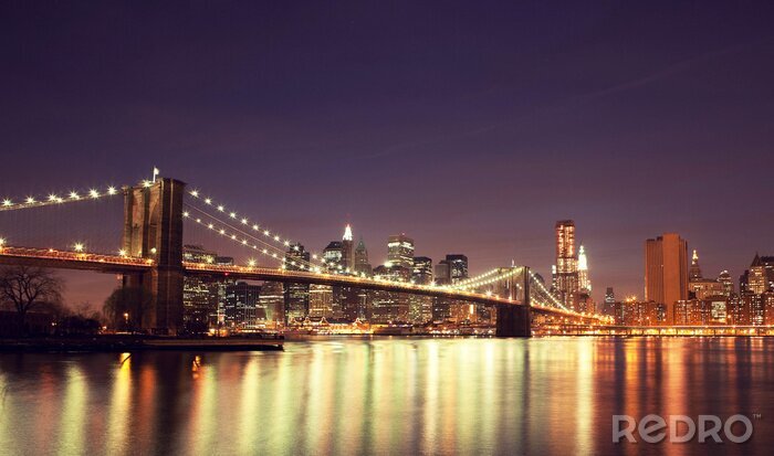 Papier peint  Colorful horizon de nuit du centre-ville de New York, New York, USA.