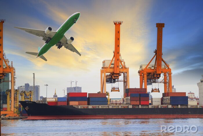 Papier peint  container ship loading on port and cargo plane flying above