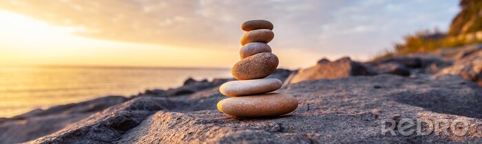 Papier peint  Coucher de soleil et pyramide de pierres