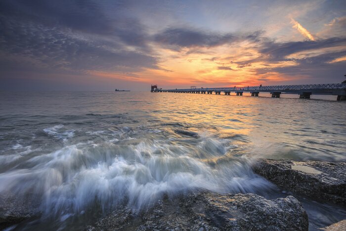 Papier peint  Coucher de soleil et vagues en mouvement