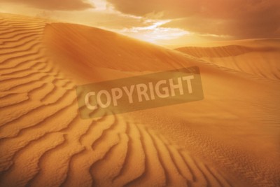 Papier peint  Coucher de soleil orange sur le désert