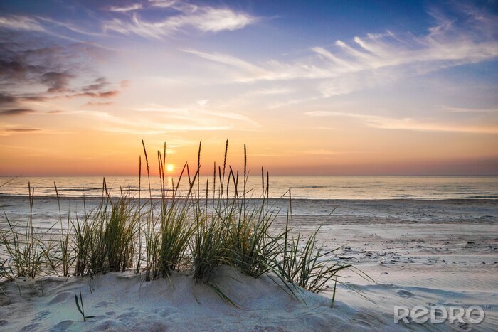 Papier peint  Coucher de soleil pittoresque sur la mer