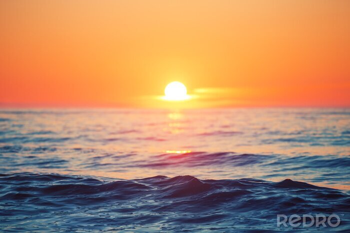 Papier peint  Coucher de soleil sur l'océan et les vagues