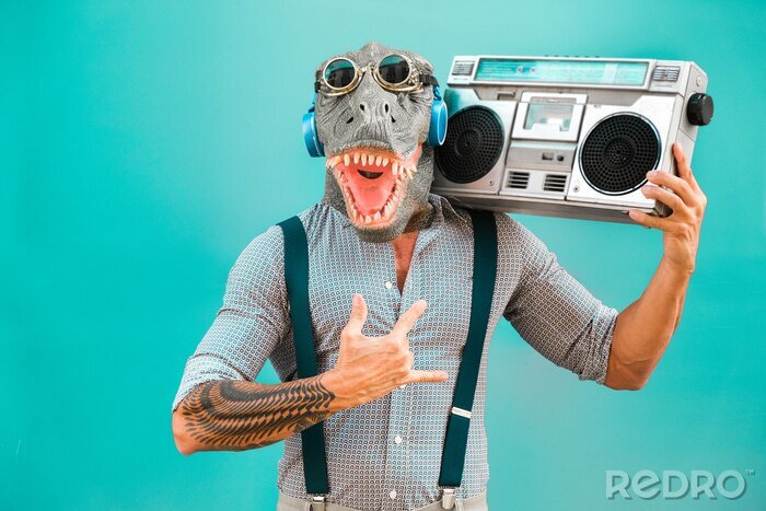 Papier peint  Crazy senior man dancing rock music wearing t-rex mask