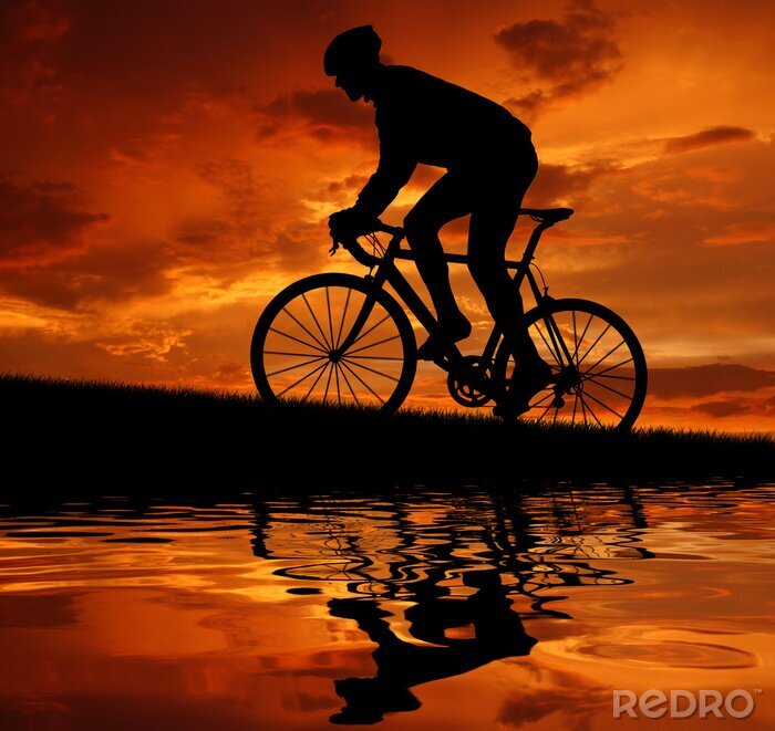 Papier peint  Cycliste au coucher du soleil