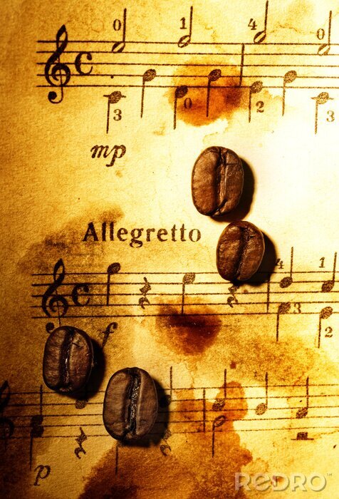 Papier peint  Des grains de café sur une feuille de musique