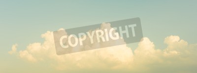 Papier peint  Des nuages sur un ciel gris