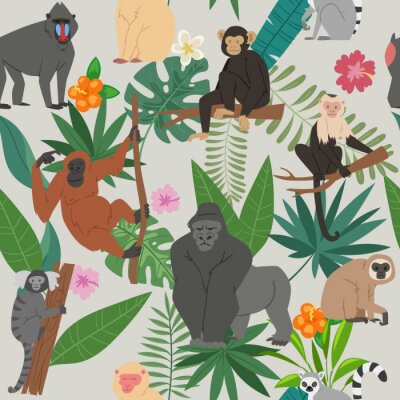 Des singes au milieu de feuilles tropicales