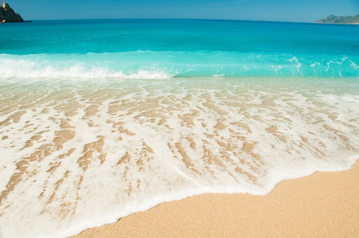 Papier peint  Des vagues douces sur la plage