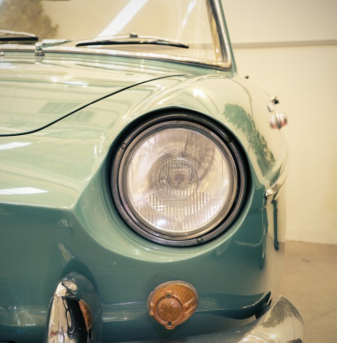 Papier peint  Détail sur le phare d'une voiture ancienne