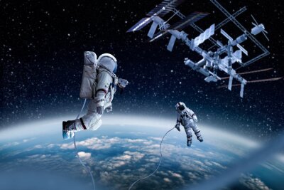 Papier peint  Deux cosmonautes à côté d'un satellite
