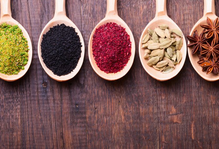 Papier peint  Épices de différentes couleurs