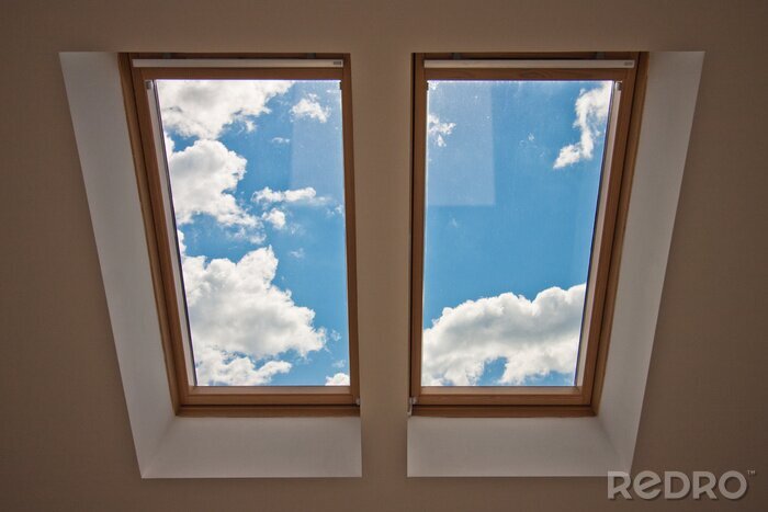Papier peint  Fenêtre de toit avec vue sur le ciel