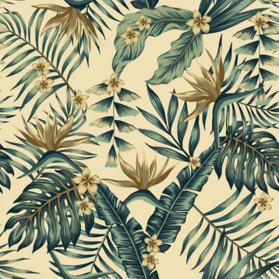 Feuilles et fleurs tropicales sur fond beige