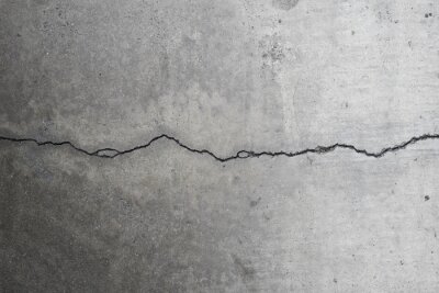 Papier peint  Fissure horizontale le long d'un mur en béton