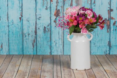 Papier peint  Fleurs roses dans un vase blanc