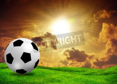 Papier peint  Football au soleil couchant