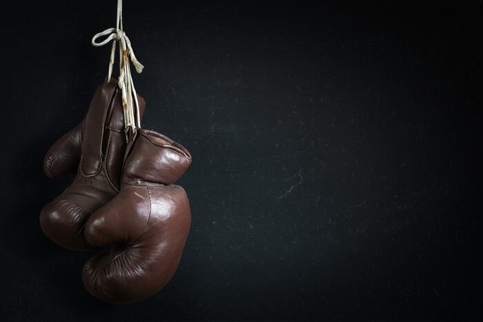 Papier peint  Gants de boxe sur fond noir
