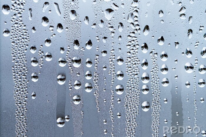 Papier peint  Gouttes de pluie sur une surface en verre