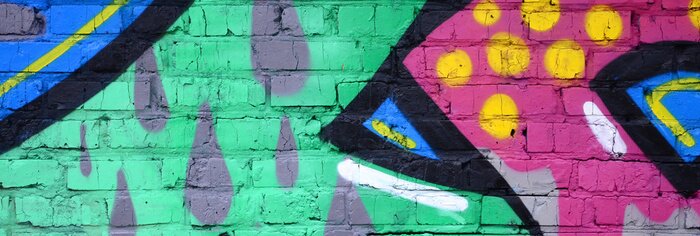 Papier peint  Graffitis colorés sur une surface murale