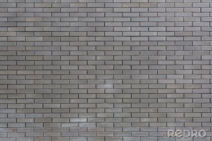 Papier peint  Grey brick wall..